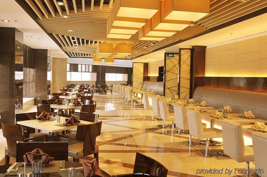 Inzone Garland Hotel Цзинань Ресторан фото
